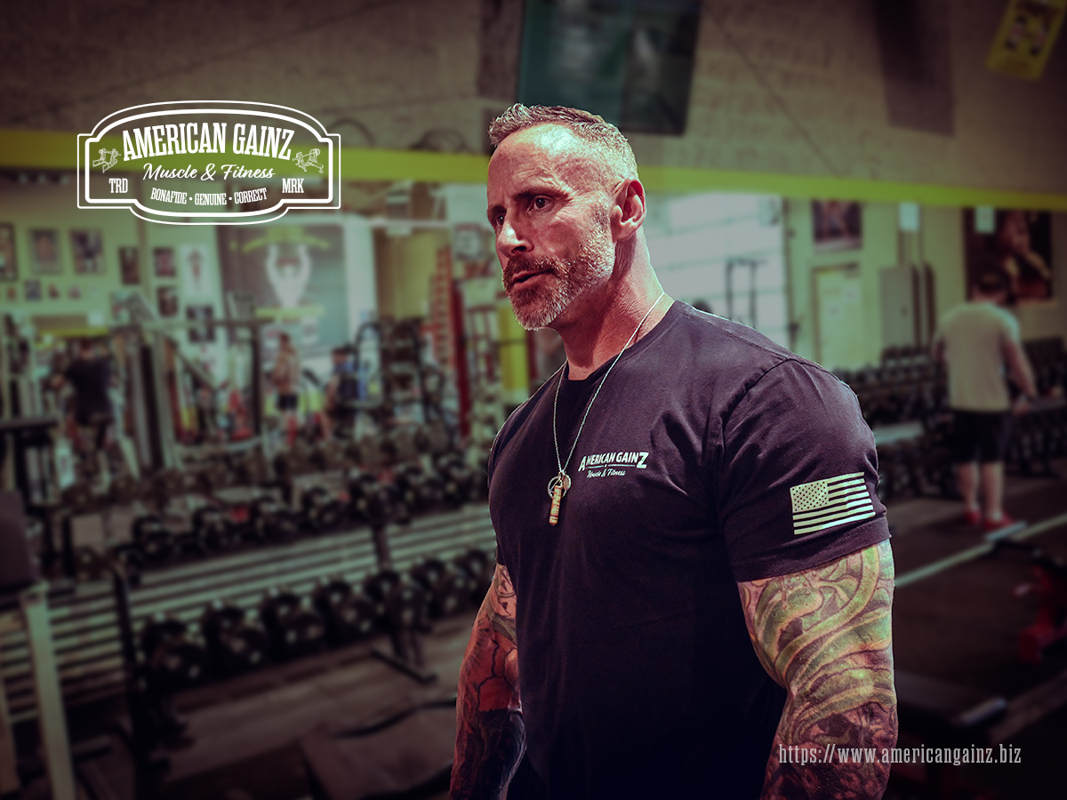 A photo of the personal trainer and lifestyle coach, Greg Maloney, looking cool on Shoulder Day.