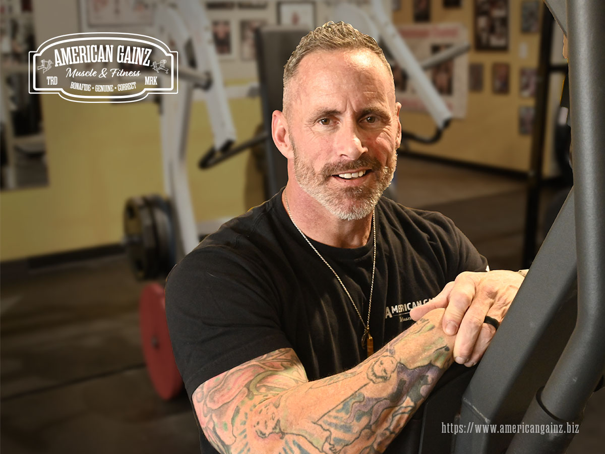 A picture of Greg Maloney, a personal trainer in Denver, Colorado, smiling at the camera.